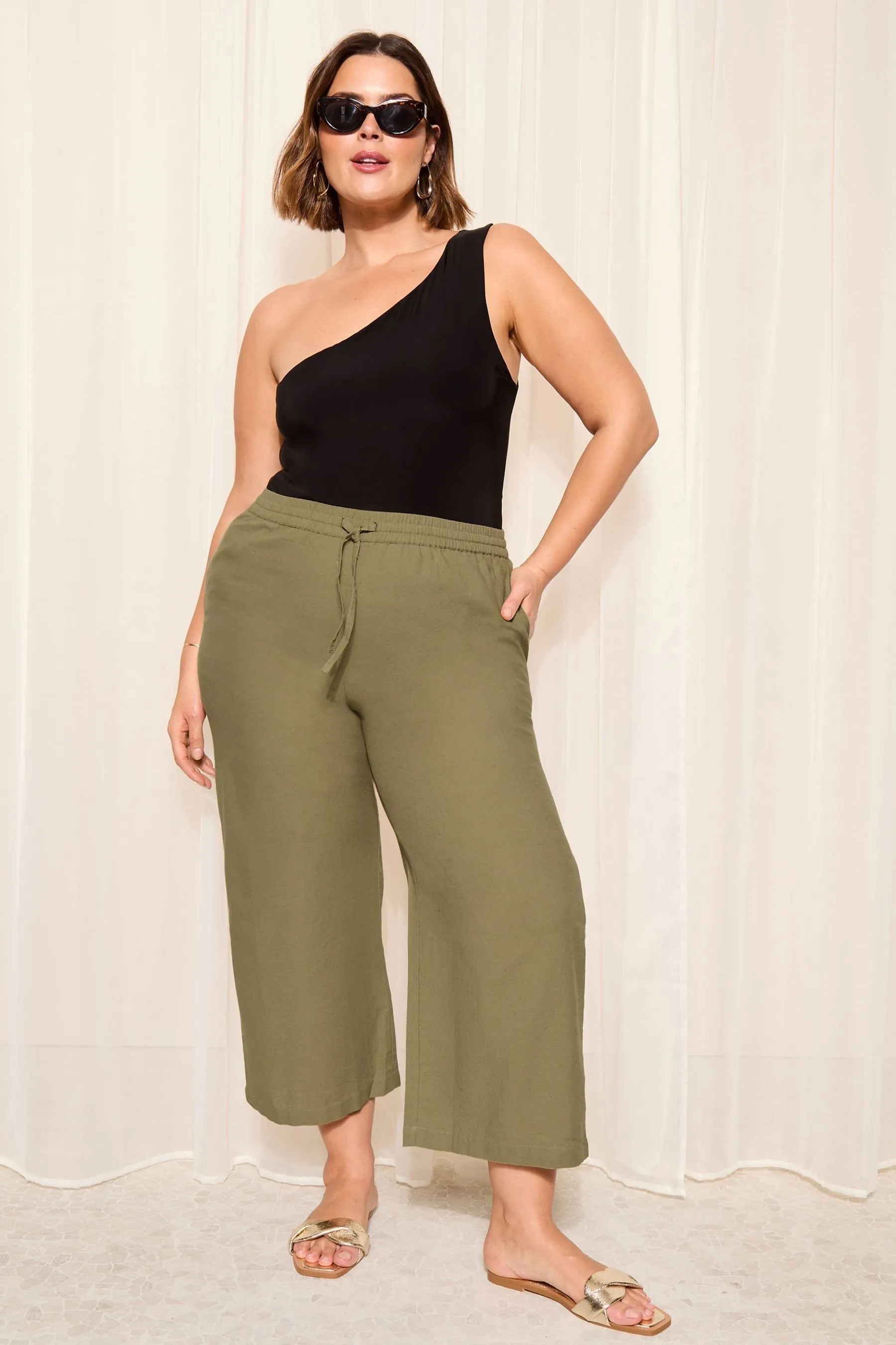 Curves Like These - Pantaloni al polpaccio in misto cotone e lino con fondo ampio