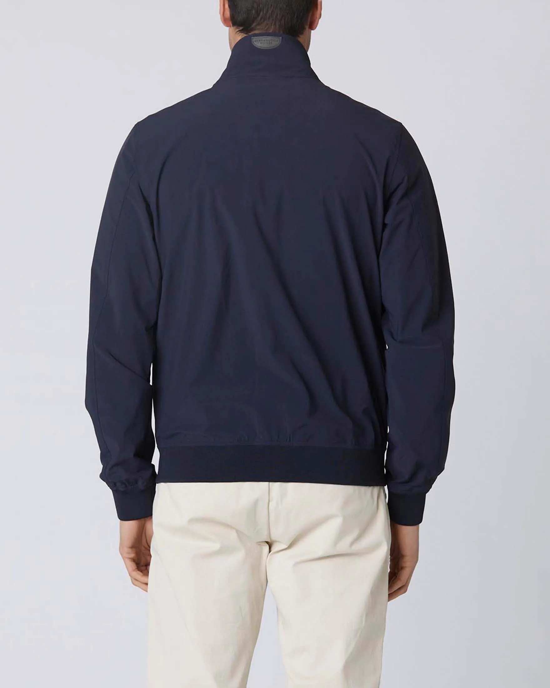 Giubbino bomber blu in tessuto stretch con ricamo aquila turrita